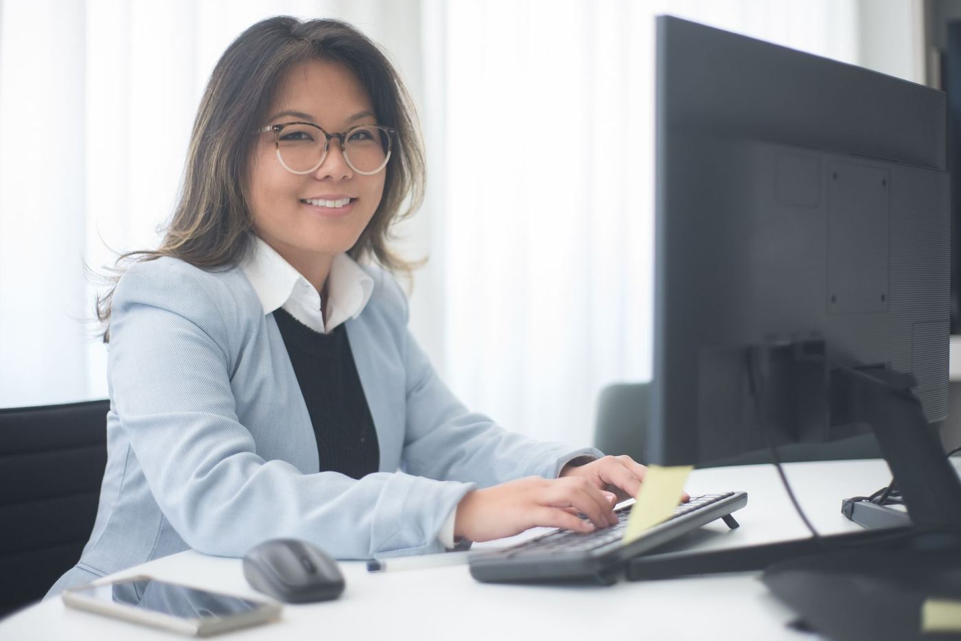 An administrator working at a computer